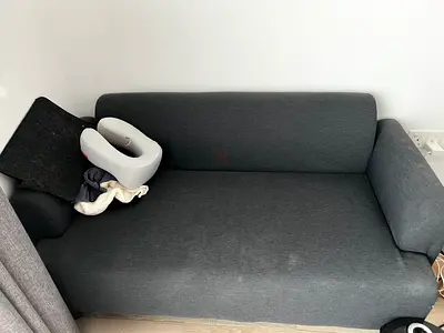 Compact 2-seater grey sofa in good condition