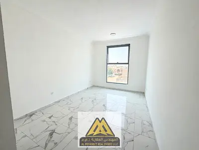 For Annual Rent in Al Rawda 1 – Ajman, a spacious two-bedroom apartment with a large living room, kitchen, balcony, and 3 bathrooms. The apartment fea