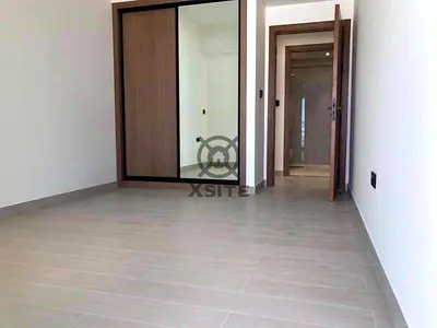 Classy 2BR|Equipped Kitchen |Pool View