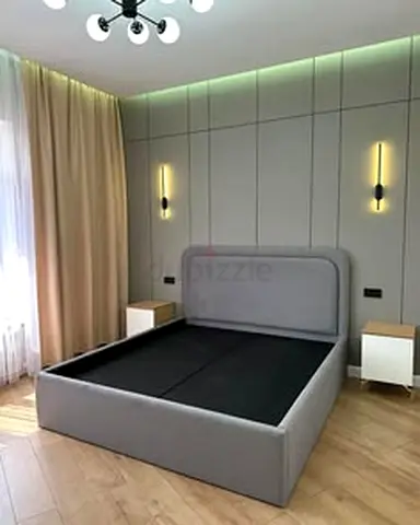 Grey fabric upholstered double bed frame with headboard
