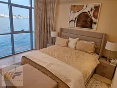 Own a spacious 3-bedroom apartment with a living area at Creek Towers (Al Rashidiya, Ajman), featuri