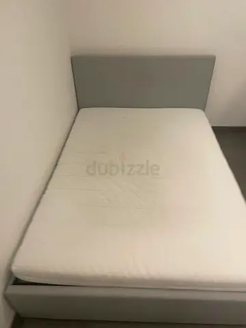 140x200 bed with mattress and upholstered headboard - good condition 2 identical beds available