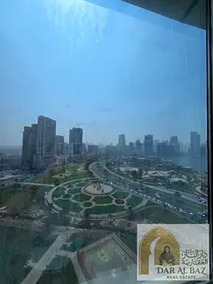 Spacious office available for annual rent in Al Majaz 2, Sharjah, featuring free air conditioning an