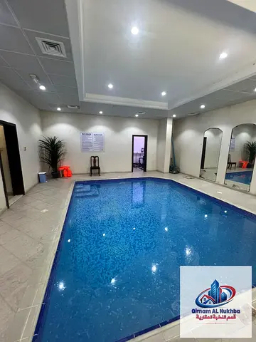 Affordable beautiful one bedroom apartment in Al Qulaya with a spacious layout central AC central gas free gym and swimming pool Close to Sharjah Ladi