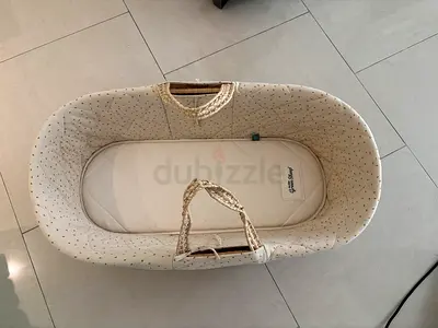 Used baby moses basket / portable bassinet - neutral cream.