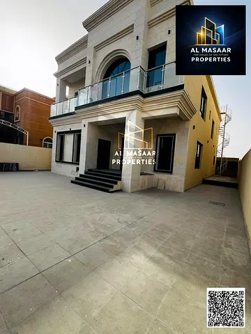 Luxury Villa for Sale in Al Rawda 3 – Ajman | First Occupant | Stone Facade | Plot Area: 5,700 sq. ft. | 5 Master Bedrooms