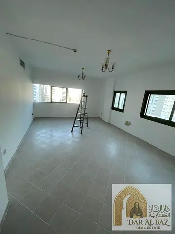 Two-bedroom apartment with a living room available for annual rent in Al Majaz 1, Sharjah. It features an excellent layout and high-quality finishing,