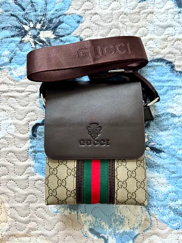 Gucci crossbody messenger bag with web stripe - brown leather & GG canvas. Price can be negotiable.
