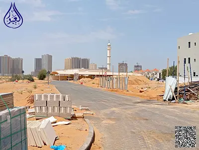 Corner residential land next to the mosque and near Azha Community, Al Helio 2.