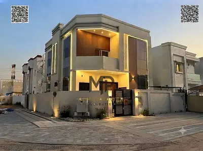 Luxury villa for sale in Al Yasmeen featuring modern design and high-end finishes; includes air conditioning and is ready for immediate occupancy. Lux