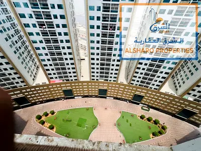 2-bedroom apartment with living room for annual rent in Pearl Towers, Al Rashidiya 1, Ajman. Annual
