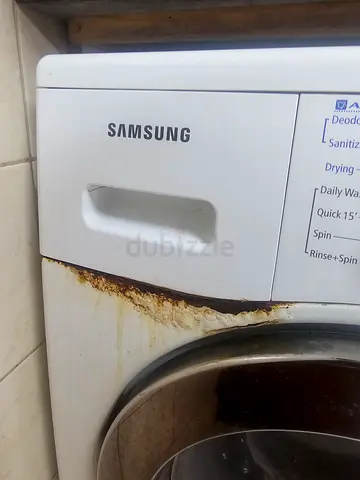 Samsung front-load washing machine — used, needs repair (rust around door)