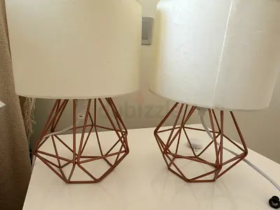 Pair of geometric copper bedside table lamps with white shades