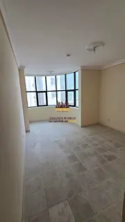 For Rent in Al Qasimia, Sharjah: A spacious 3-bedroom apartment with a large living room, offering v