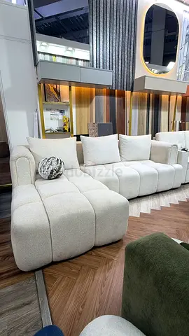 L-shaped modular cream fabric sofa with chaise lounge (4-seater)