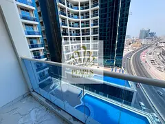 A luxurious two-bedroom apartment with a living room is available for annual rent in Al Waha Towers,