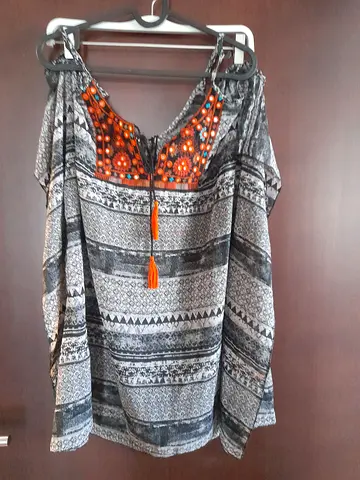 Lightweight patterned women's cold-shoulder top with beaded neckline - size unknown