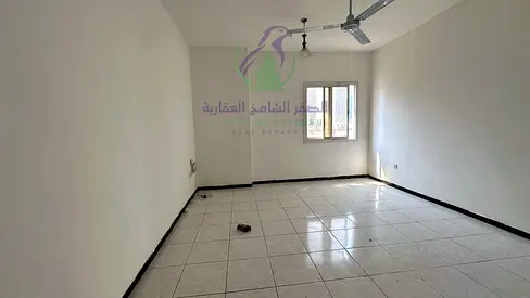 Spacious 1-Bedroom Apartment with Balcony & Built-in Wardrobes in Al Majaz 2