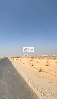 Two adjacent plots of land are available for sale in Al Sihmah, Sharjah, in a convenient location su