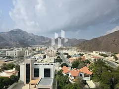 1-Bedroom Apartment for Rent in Khorfakkan Resort | Brand New | First Occupancy | City & Mountain Vi