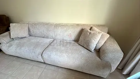 Light grey 4 seater fabric sofa with cushions - very good condition