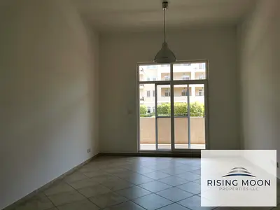 Motor City 1BR | Community View | Balcony Apartment