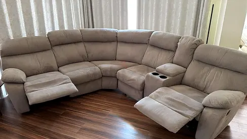 Light brown 6-seater curved reclining sectional sofa with cup holders