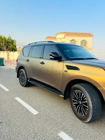 2017 GCC Nissan Patrol white fully Converted to PPF GOLD COLOR to 2024