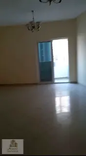 Available for annual rent in Sharjah, Al Taawun area – 2-bedroom apartment with a living room and