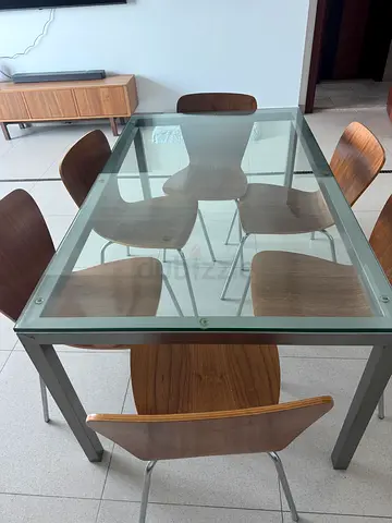 Crate and Barrel Glass top dining table with 6 wooden chairs - modern set