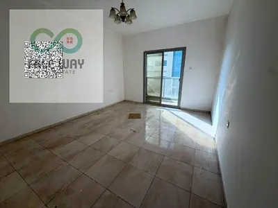 For rent in Ajman, Al Rashidiya (near Mina Street): rooms and a living room.