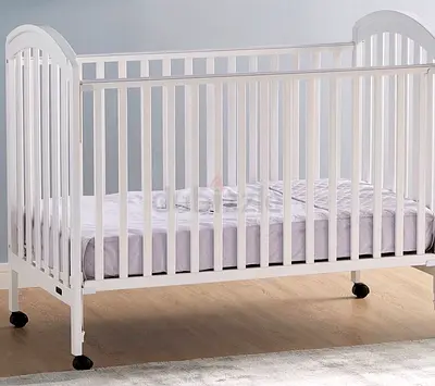 White Wooden Baby Crib with Wheels - Very Good Condition