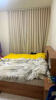Spacious Furnished Room with Separate Bathroom – 2 Mins to Emirates Towers Metro (Ladies Only)