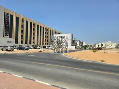 A mixed-use (commercial/residential) plot of land is available for sale in the Al Tallah 2 area of 