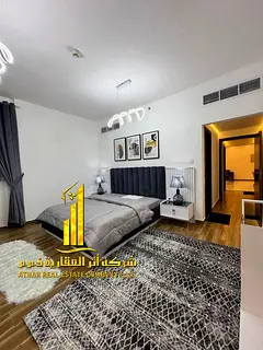 Luxury apartment—second occupancy—featuring a bedroom, living room, and open balcony. Located on