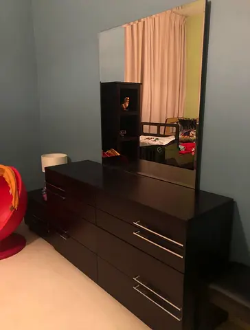Dark wood 8-drawer dresser with large mirror