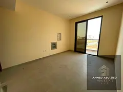 Brand-new 1BR for annual rent in Al Alia, near Dubai exit. 2 baths, balcony, central AC & 1 month fr