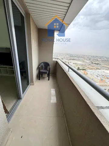 A distinctive apartment for sale, featuring a bedroom and a living room along with a private parking space. It boasts exceptional views of the Al Maja