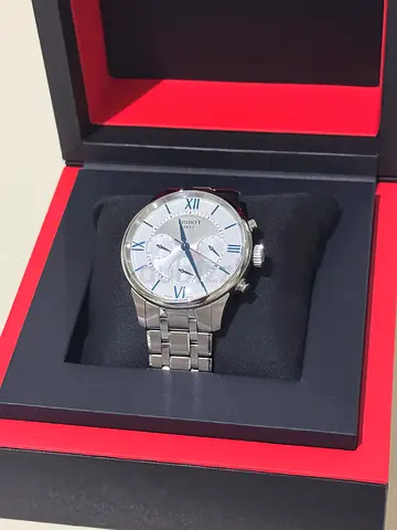 Men's stainless steel chronograph wristwatch with silver dial