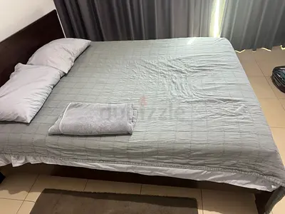 IKEA Queen bed frame with mattress and bedding - solid wood, good condition