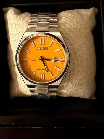 Citizen automatic men's watch with yellow dial, stainless steel bracelet