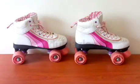 White and Pink Quad Roller Skates - Girls Size (Good Condition)