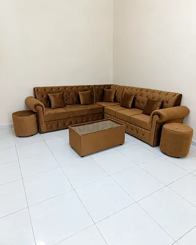 Get the best rates for brand new L shape brown color with table and 2 stools available