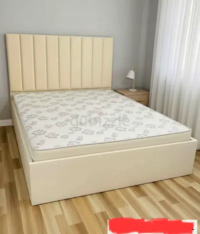 Queen cream upholstered bed frame with mattress
