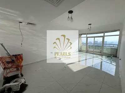 Premium 2BR in Horizon Towers, Al Rashidiya 1, with 3 baths, balcony, open view, built-in wardrobes