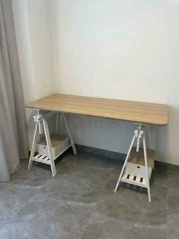 Wooden desk with modern white trestle legs — like new