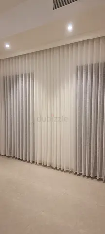 Ready-made ivory sheer curtains with grey blackout lining - like new