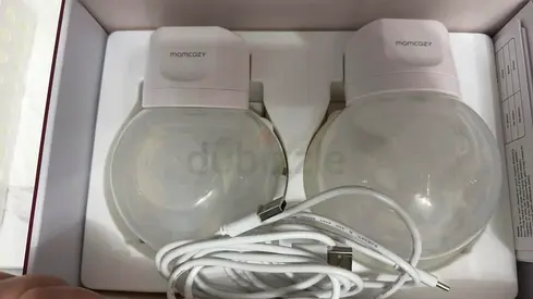 Momcozy Double Electric Breast Pump (two pump units, new condition) & Baby Basinnet
