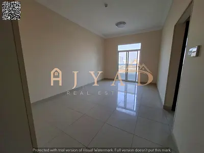 1BR with private parking in Al Jurf 3, Ajman, annual rent. 2 baths, wardrobes, balcony, central AC,