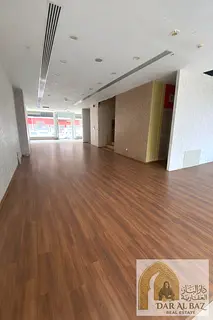 Commercial mall available for annual rent in the Al Shuwaiheen area of Sharjah; a three-story